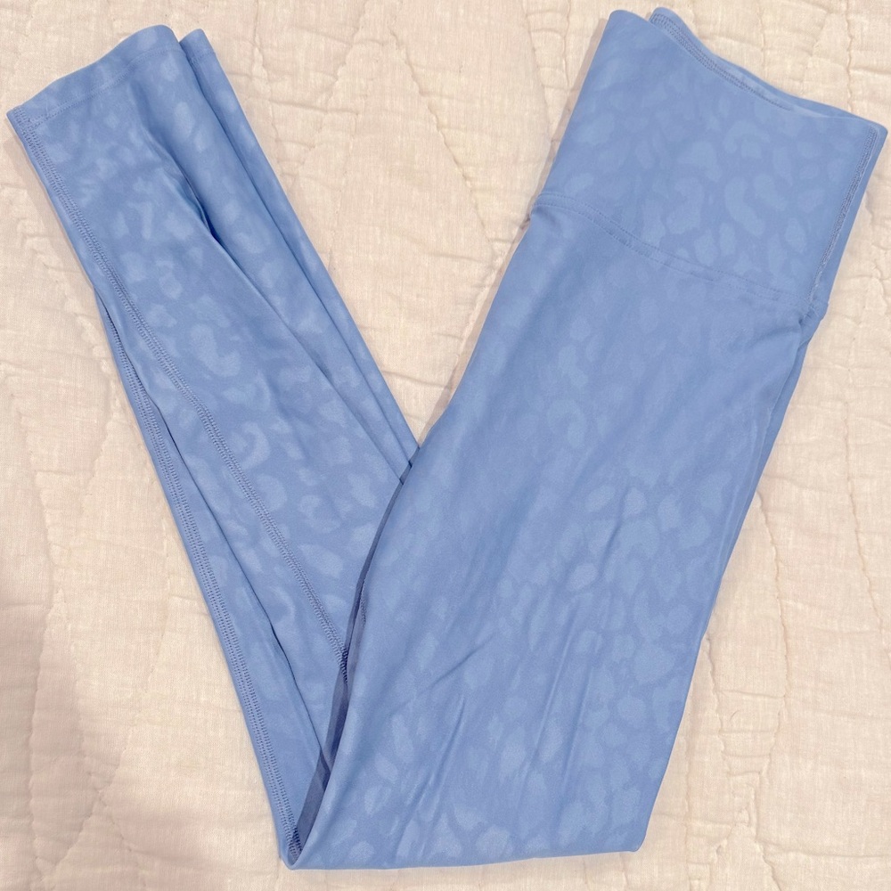 Carbon 38 blue leggings with cheetah print. Size small.